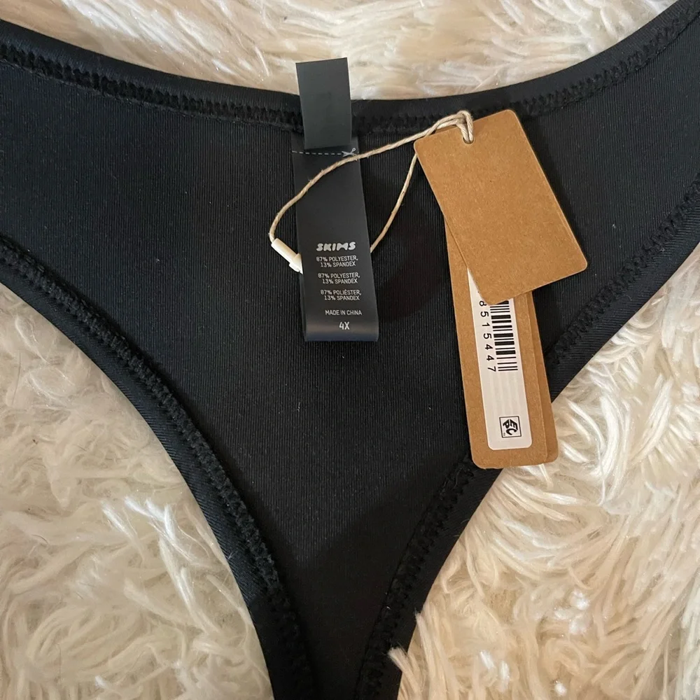 Skims swim tanga onyx thong bottom